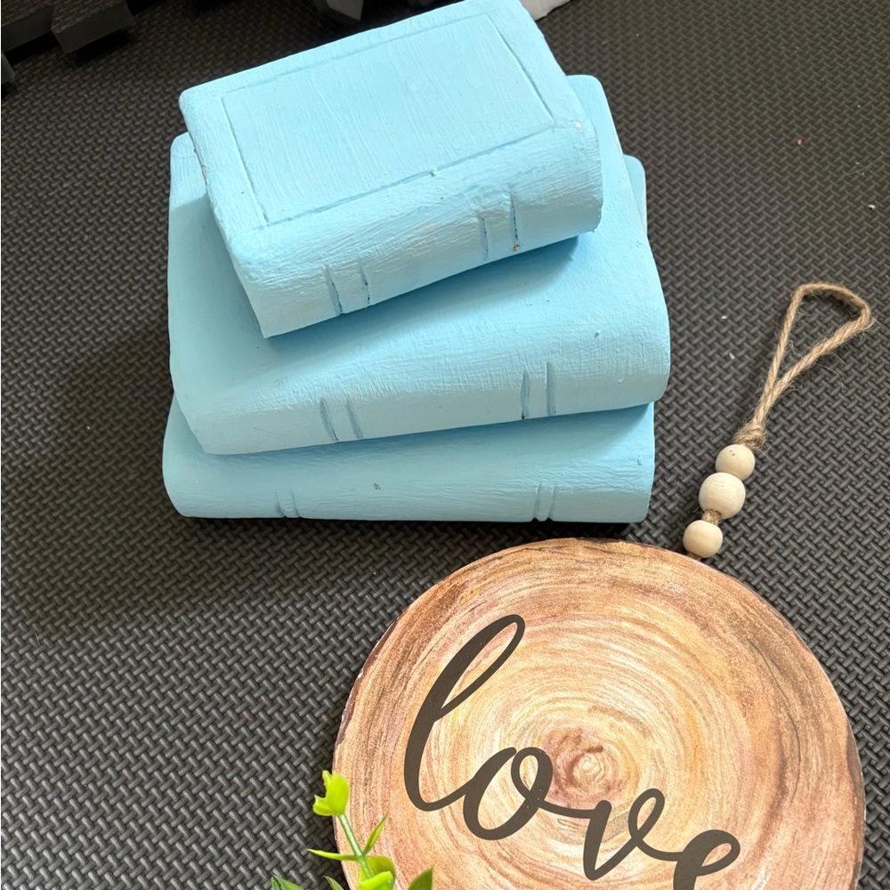 Baby blue stacked ceramic books decor